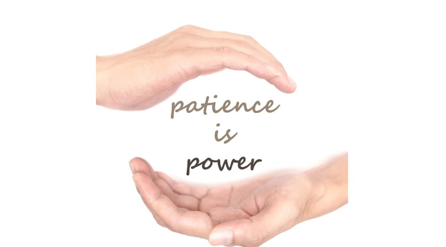 The image shows the phrase "patience is power" between pair of open hands.